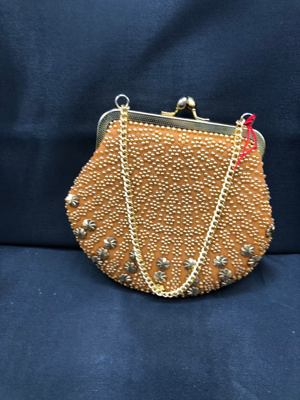 Vintage dark orange clutch with flowers