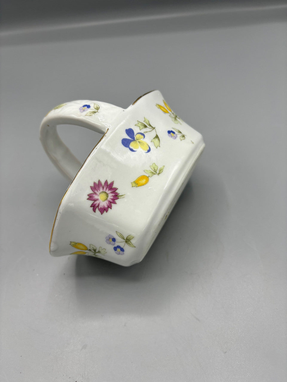 Small ceramic floral basket