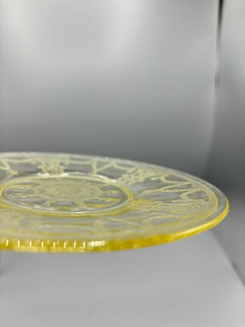 Yellow depression glass saucer