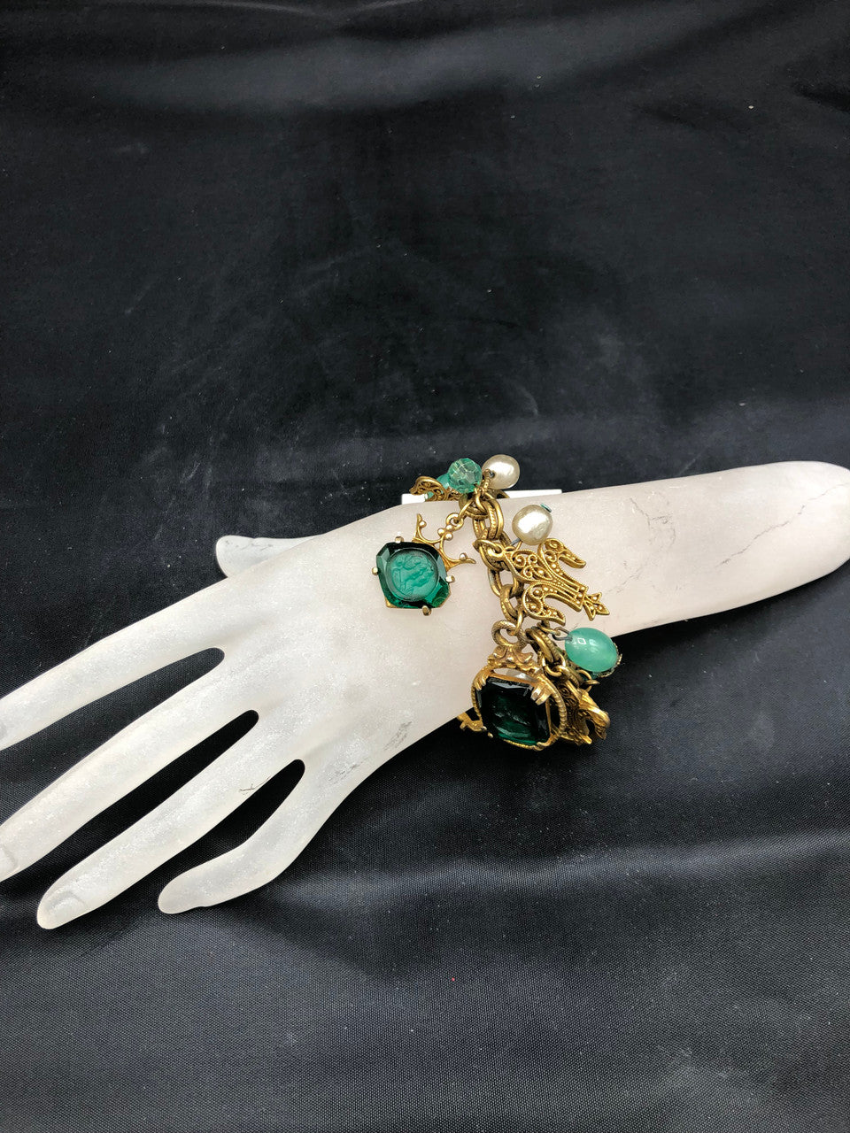 Link Bracelet with cut green glass