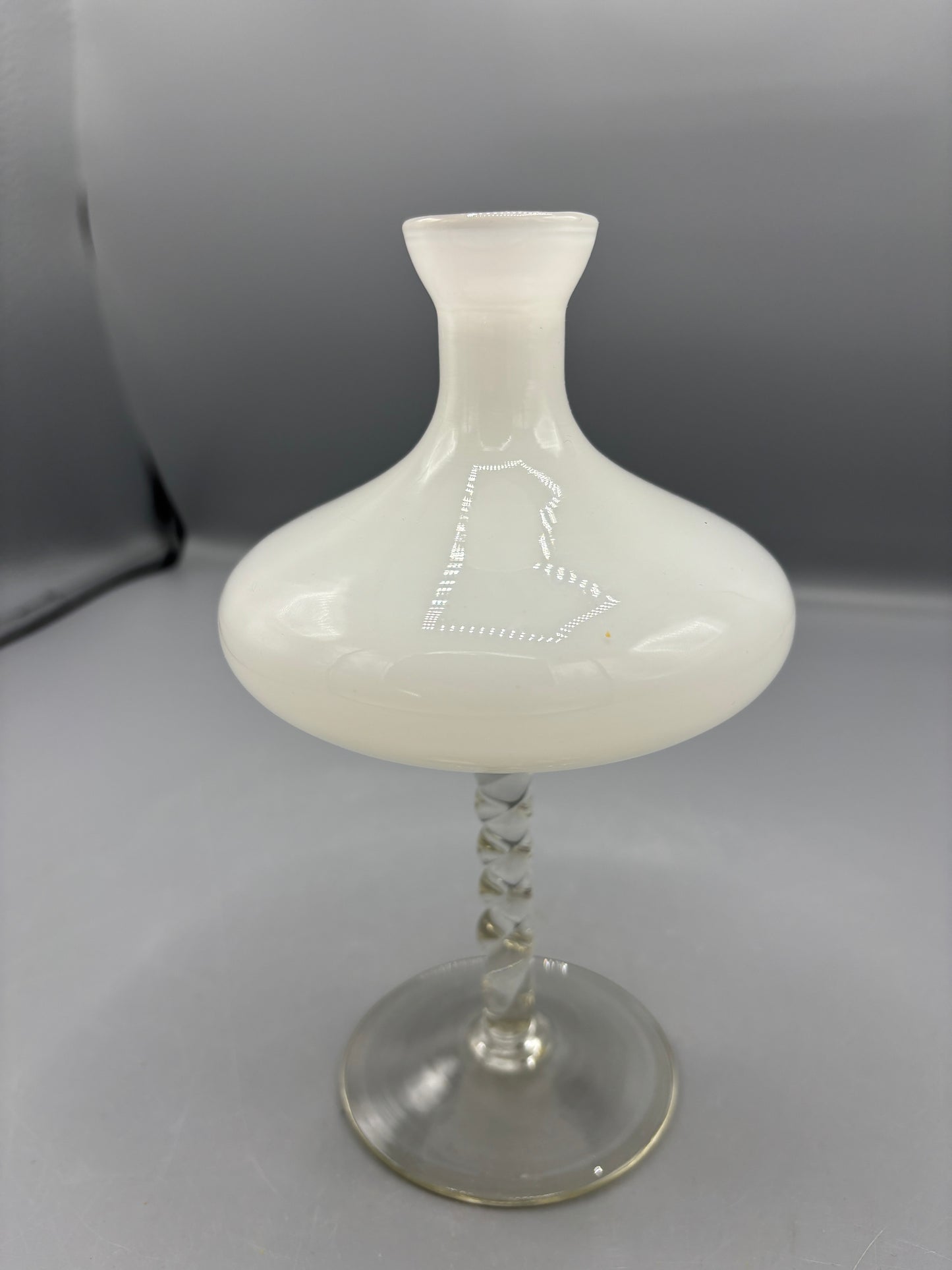 White Opalescent glass vase with a twisted stem