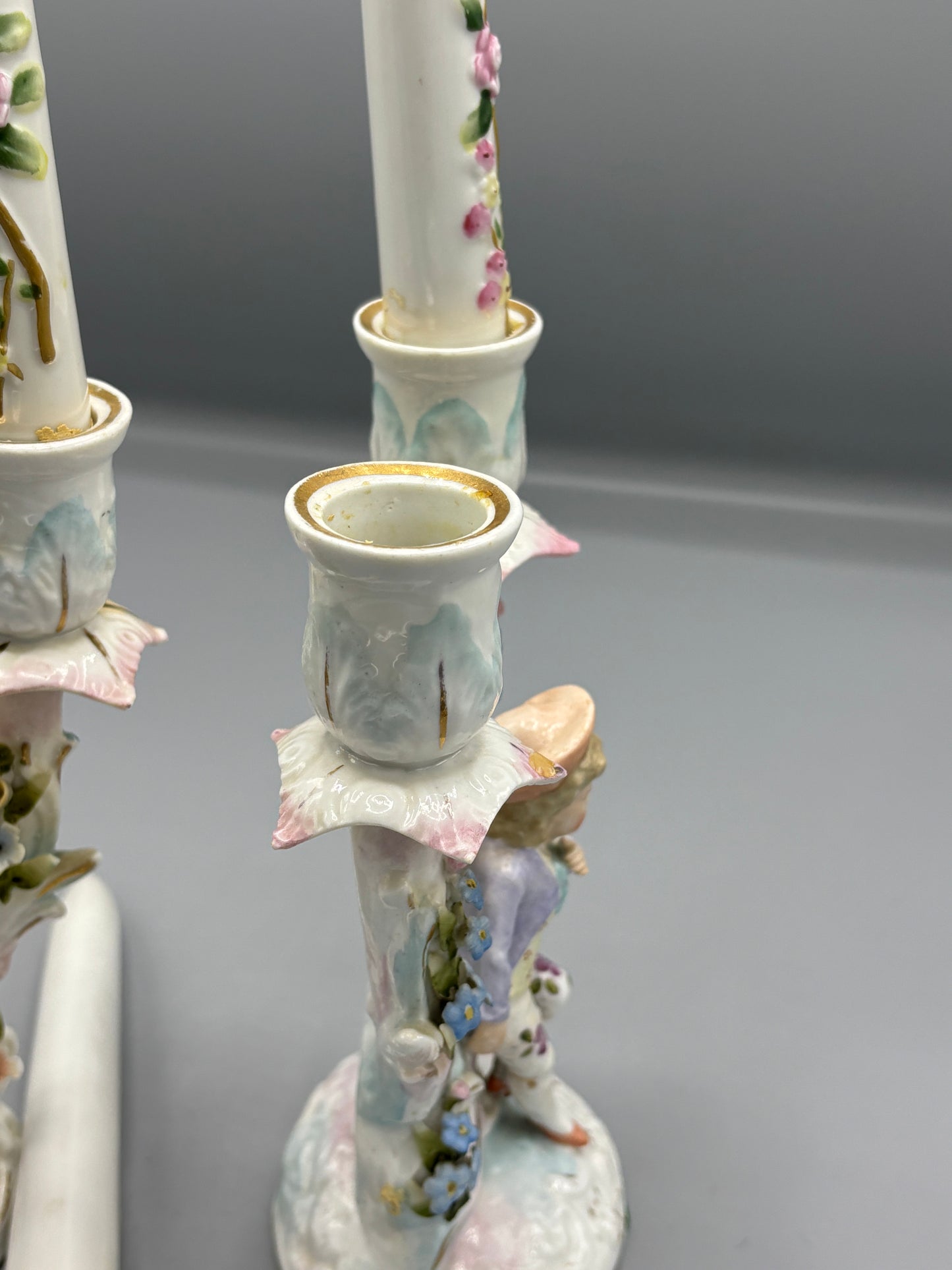 Pair of girl & boy candelabra with ceramic candle