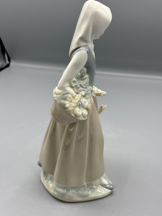 Nao porcelain figure girl with a goose & flowers