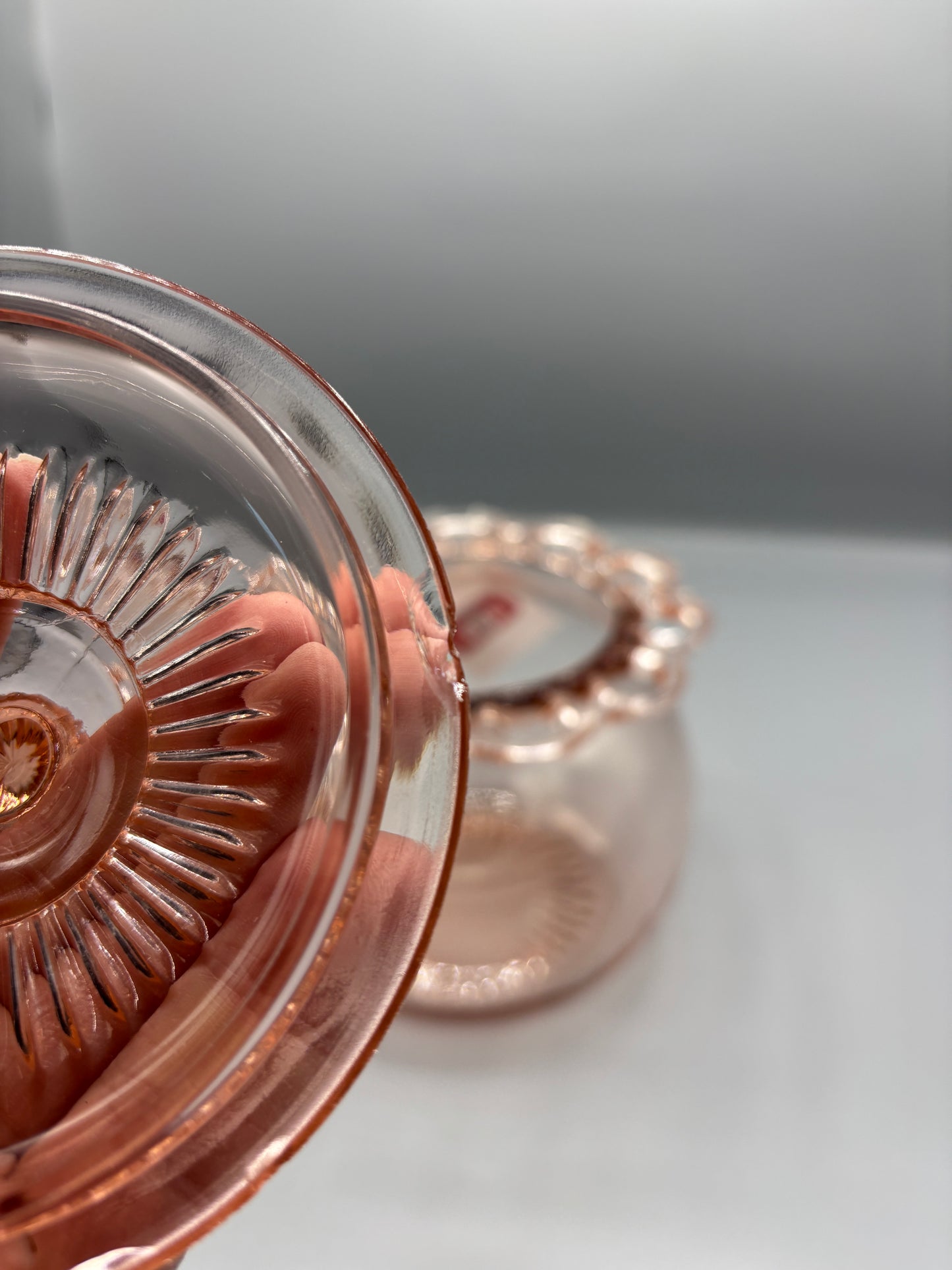 Vintage pink depression glass cookie jar with lid