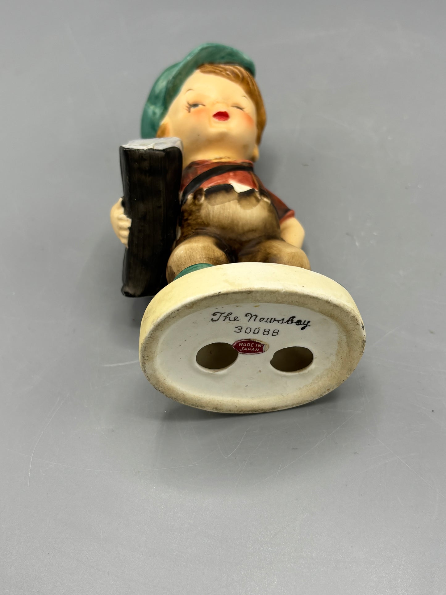 Vintage ceramic figure The Newsboy