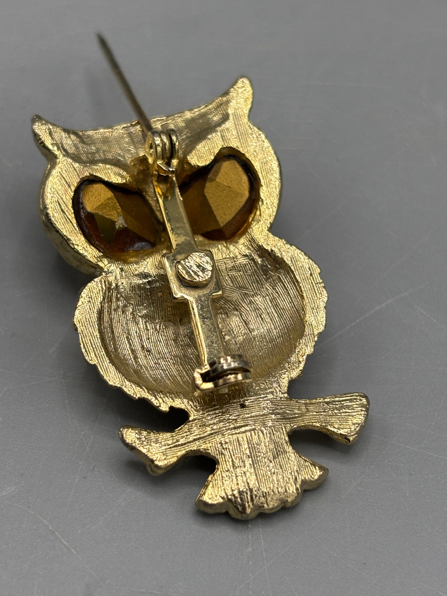 Vintage yellow tone owl with big yellow eyes