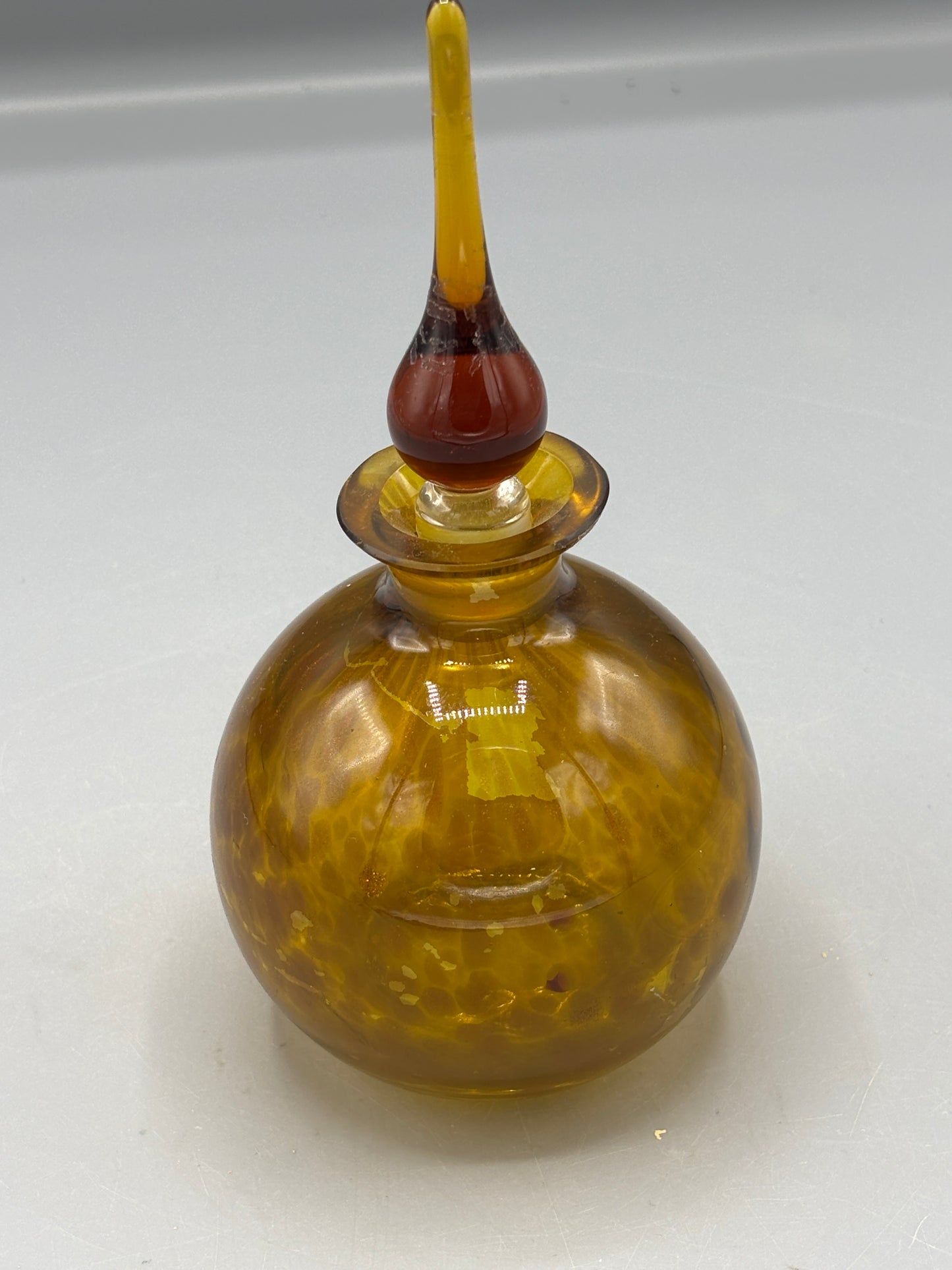 Brown perfume bottle with stopper