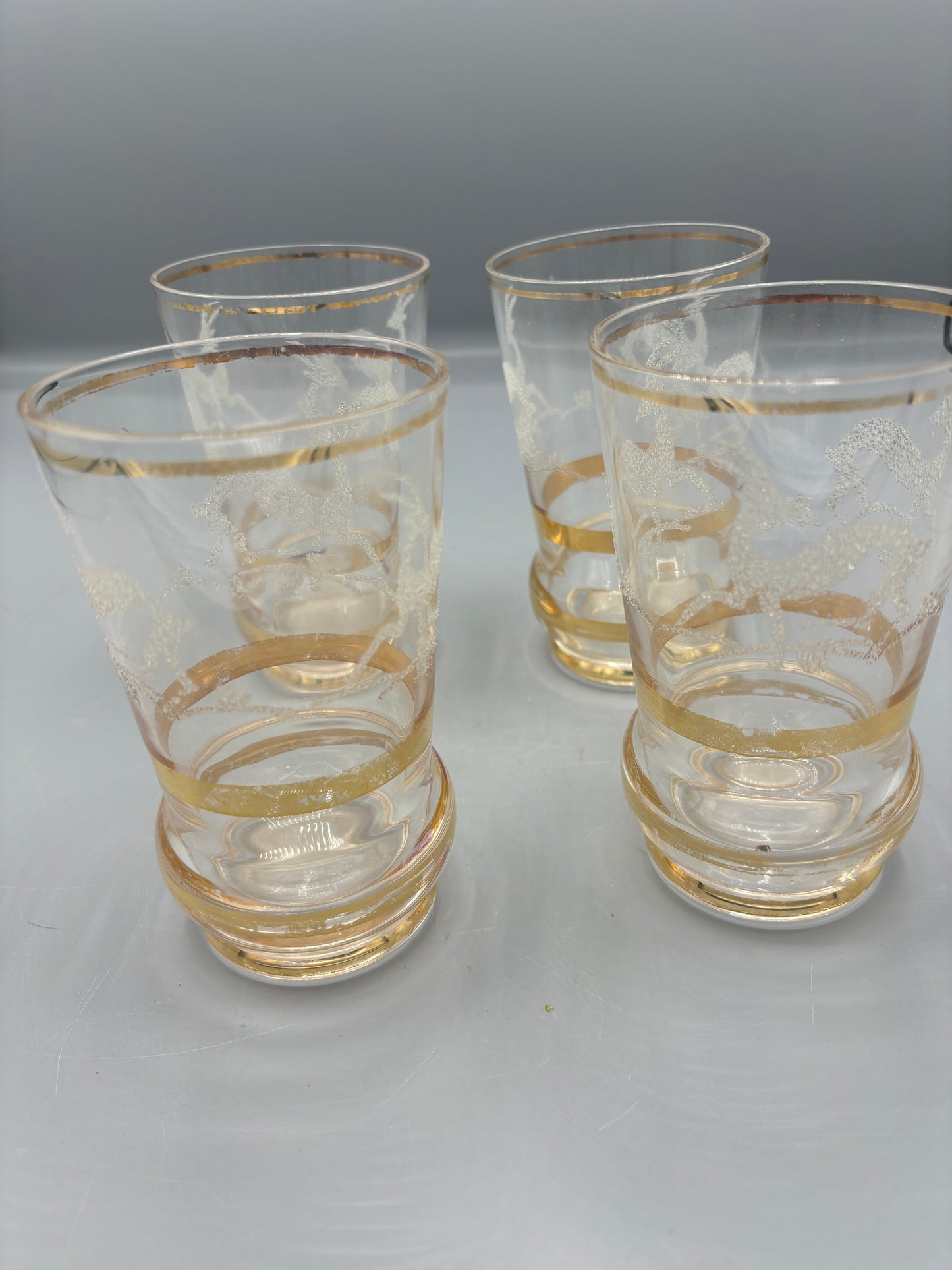 Worn gold set of 6 vintage Gazelle glasses