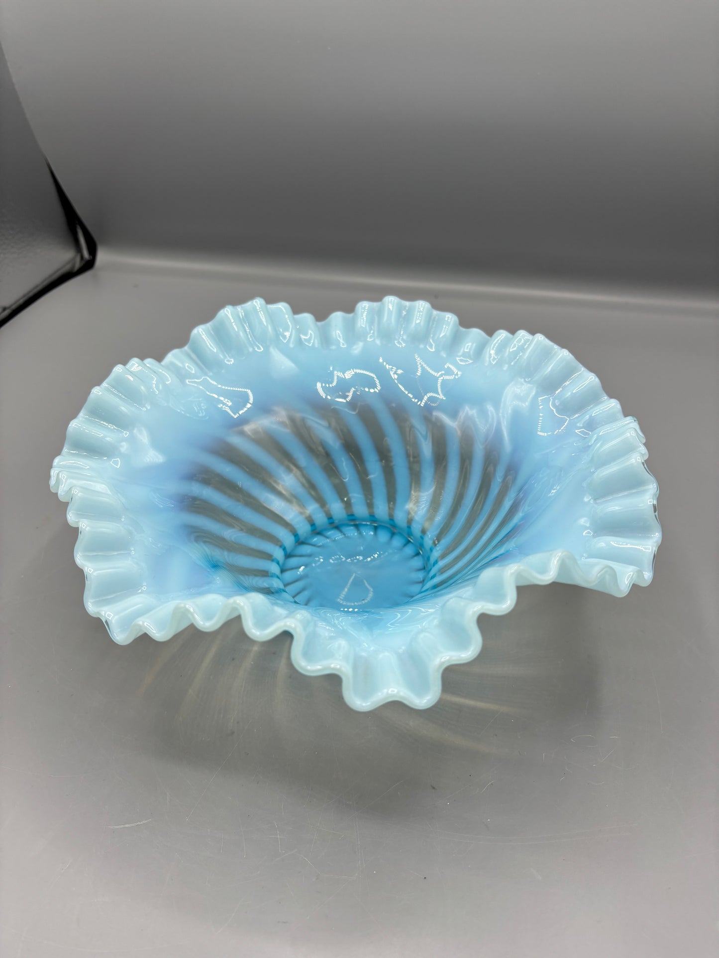 Vintage Fenton blue opalescent spiral optic bowl