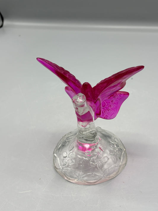 Vintage Fenton cranberry butterfly in a branch ring holder