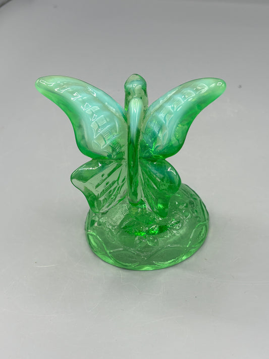 Vintage Fenton Uranium butterfly in a branch ring holder