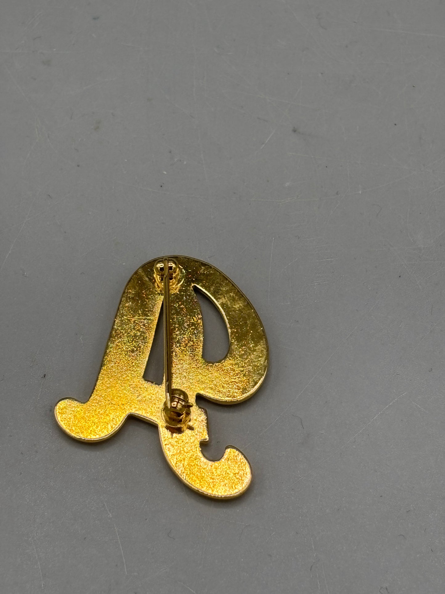 Vintage gold tone A initial brooch