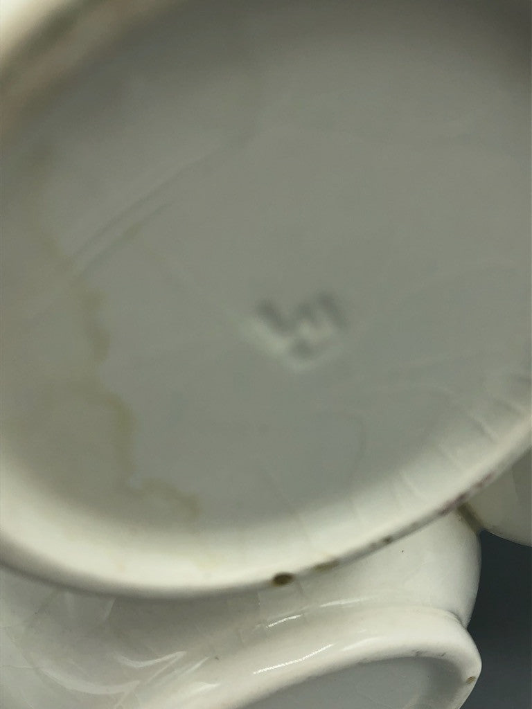 White fuddling cup vase