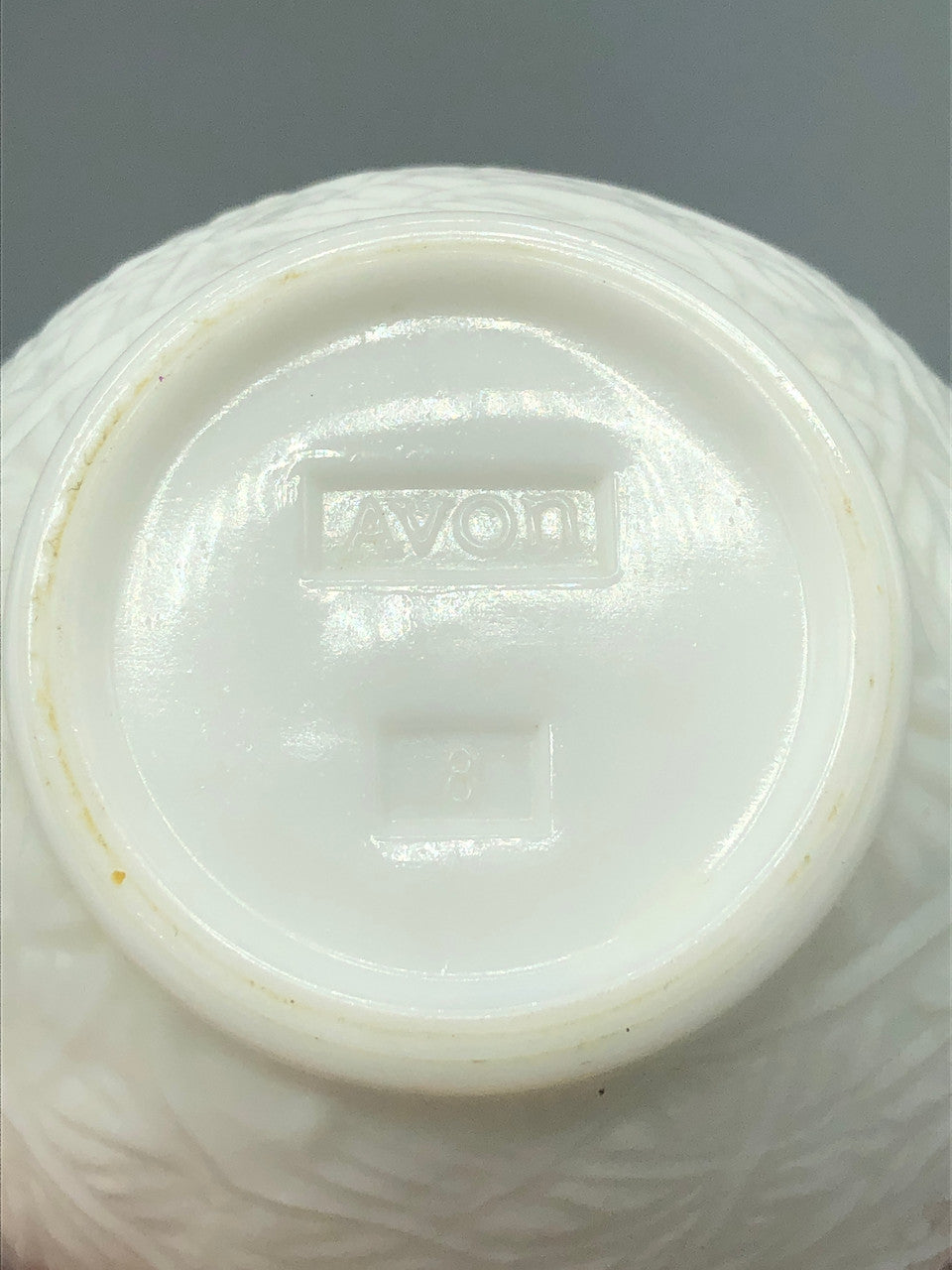 Avon milk glass bird on nest dish
