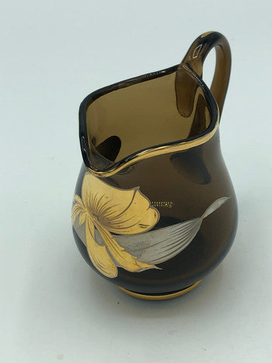 Brown glass creamer with gold & silver flowers