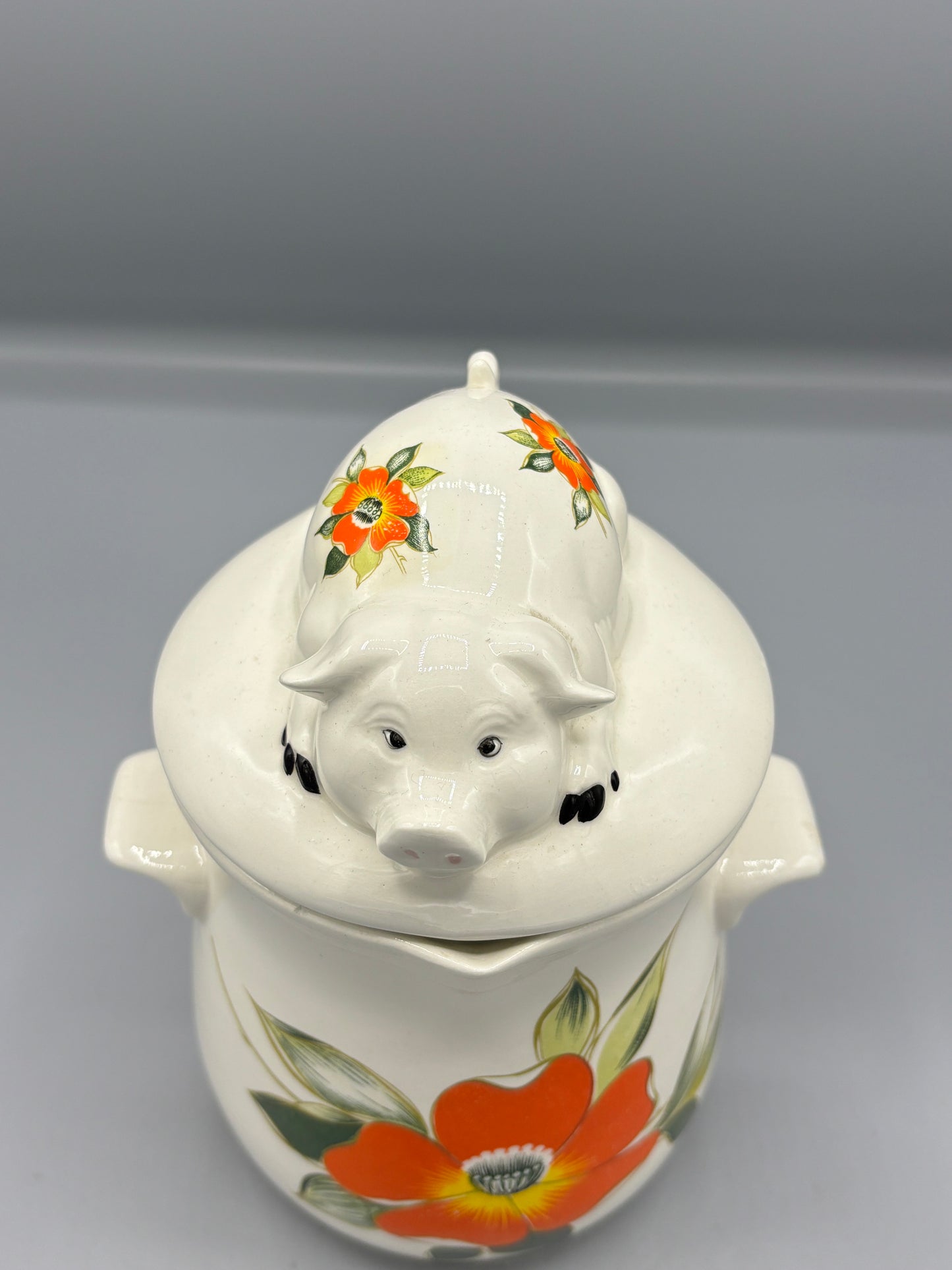 Ceramic orange flower pig canister