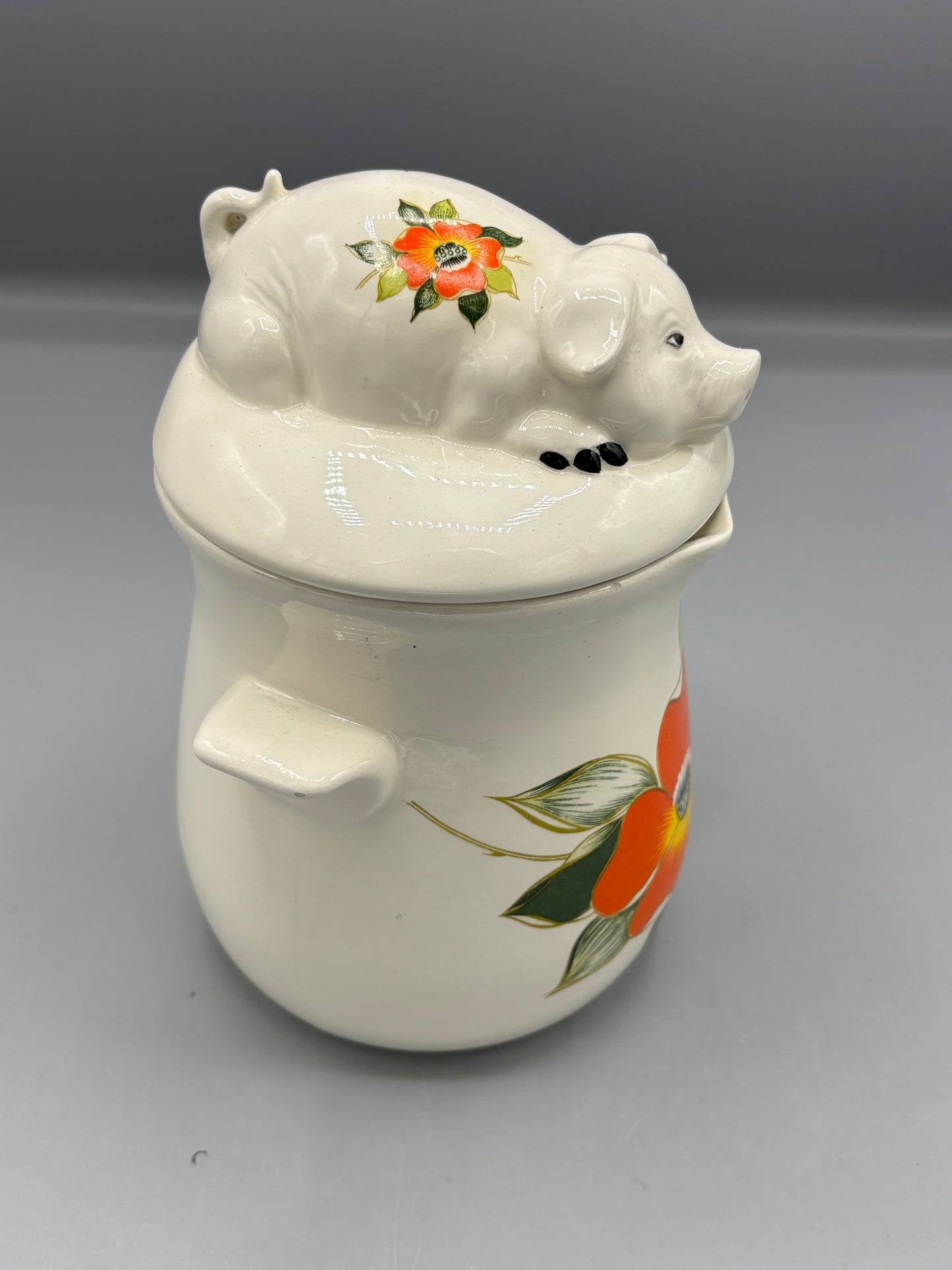 Ceramic orange flower pig canister