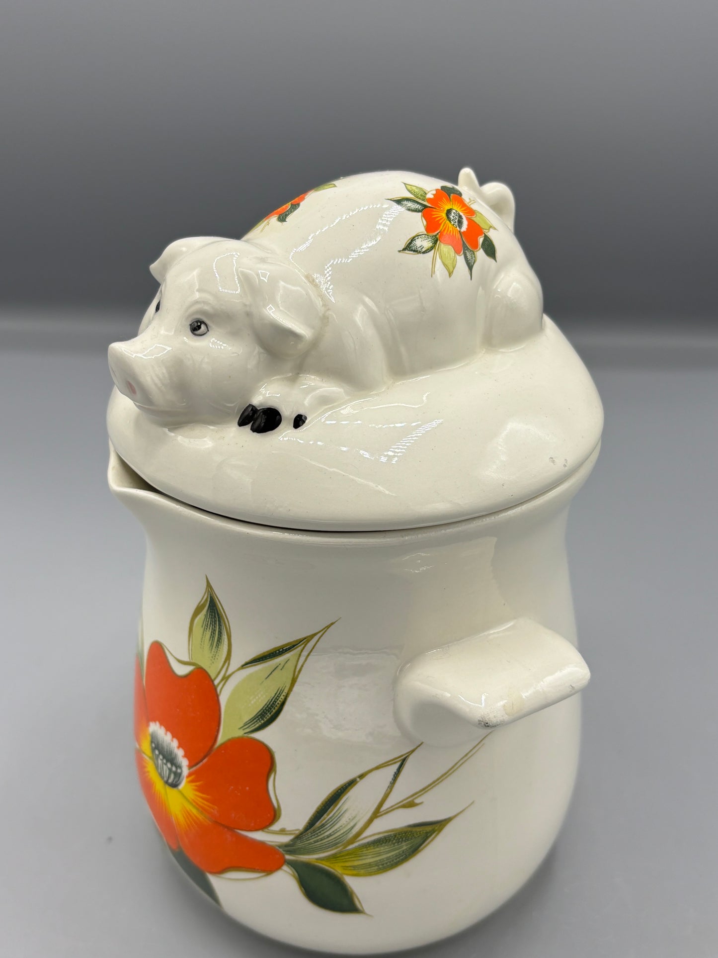 Ceramic orange flower pig canister