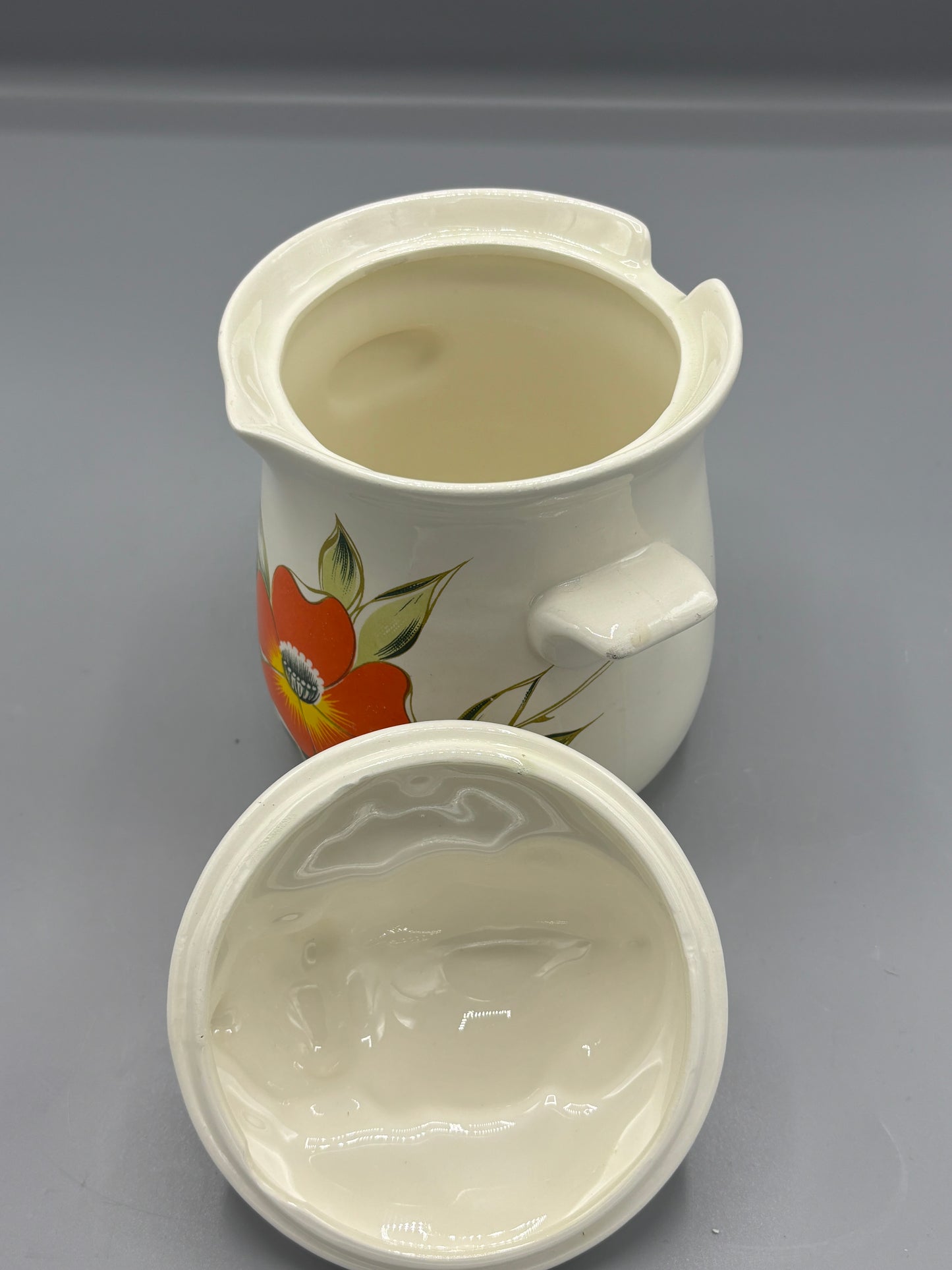 Ceramic orange flower pig canister