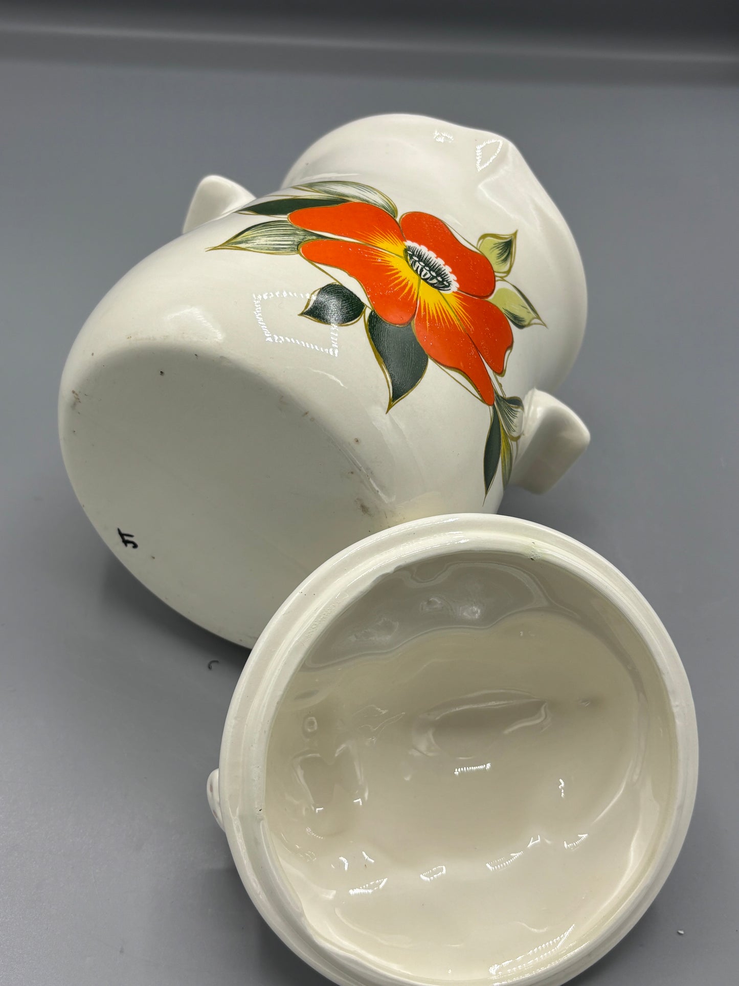 Ceramic orange flower pig canister