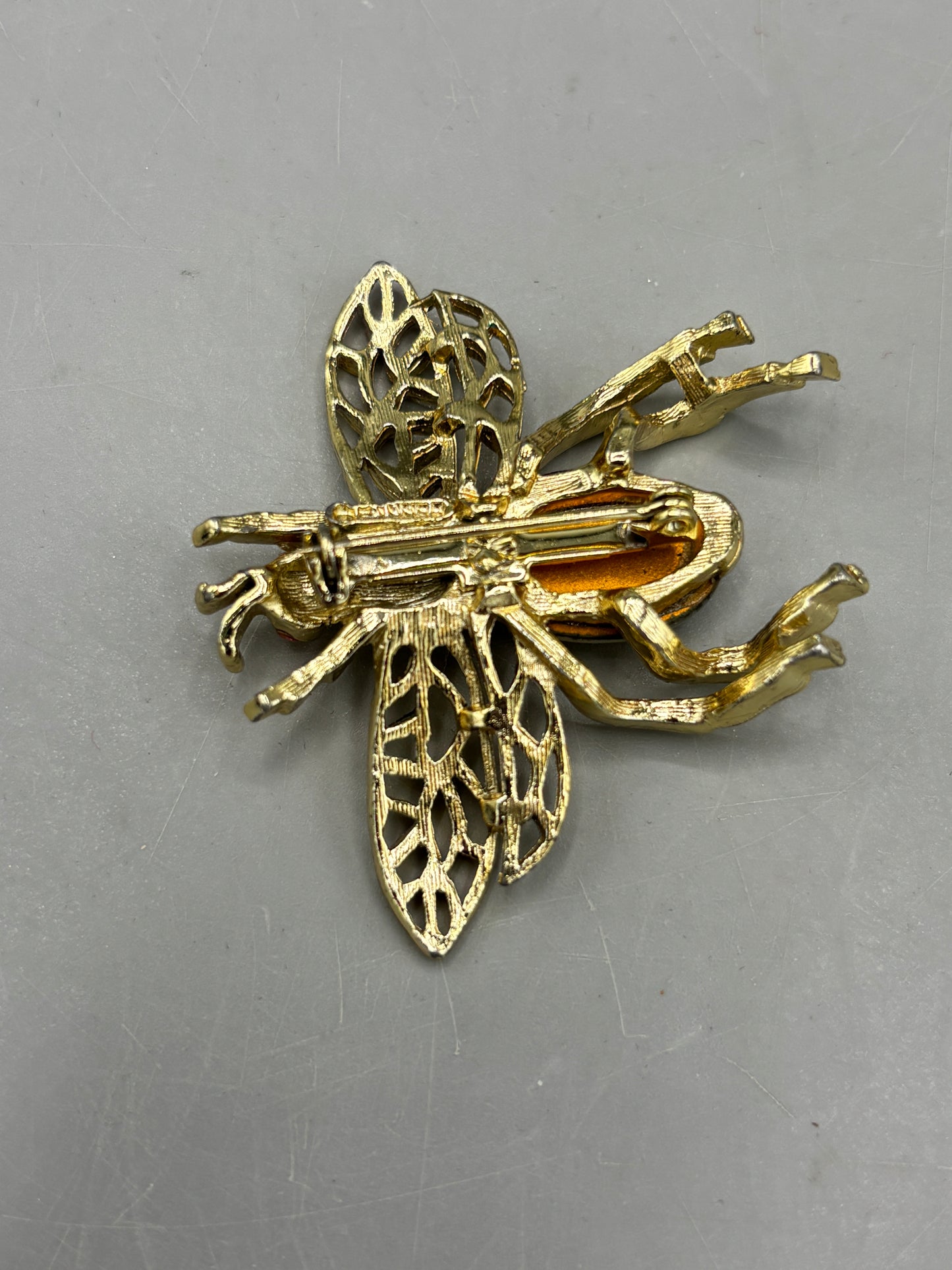 Vintage gold tone bee brooch with moonstone