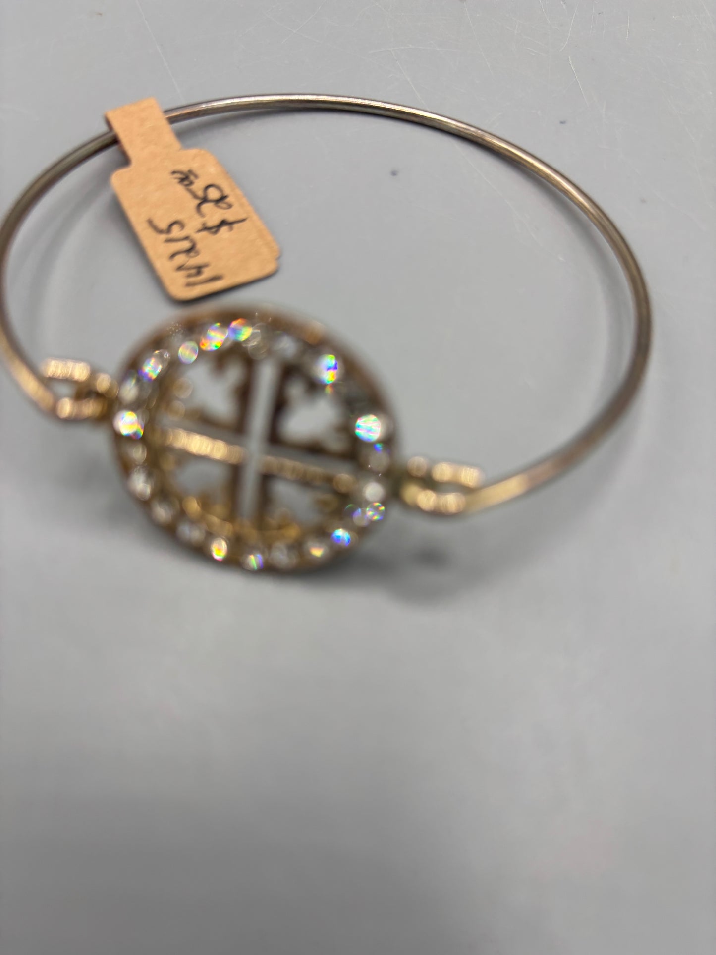 Gold tone Tory Burch style bangle