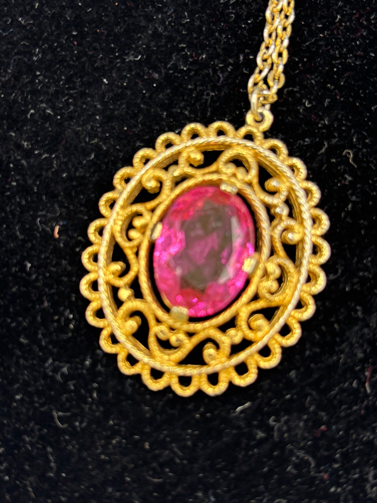 Gold tone chain pink pendant