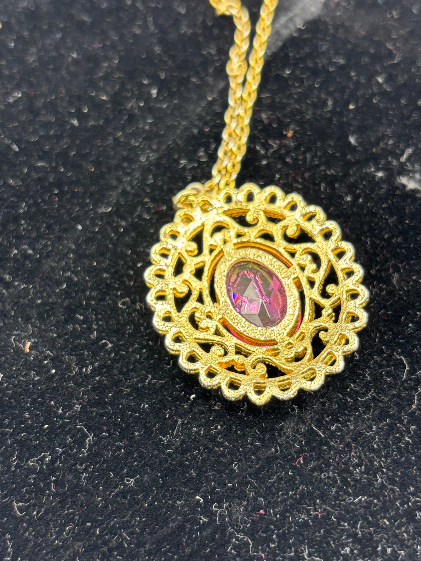 Gold tone chain pink pendant
