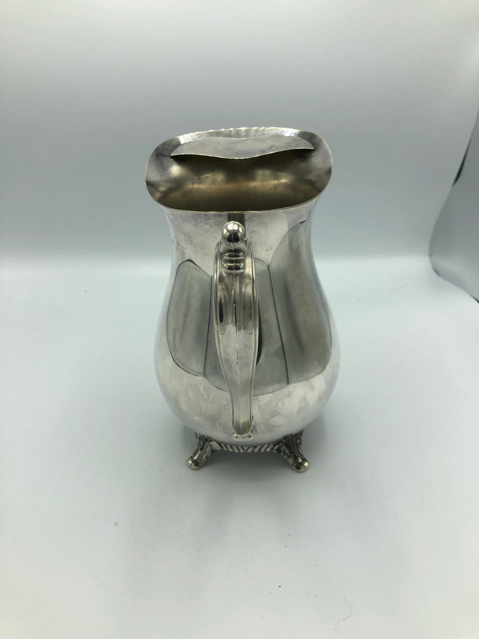 W.M. Rogers silver plated water pitcher with guard