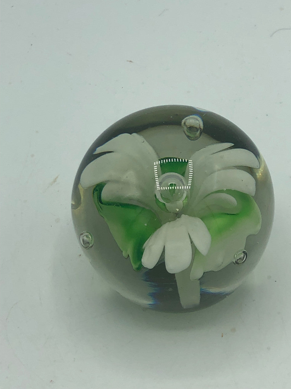 Hand blown white flower paperweight