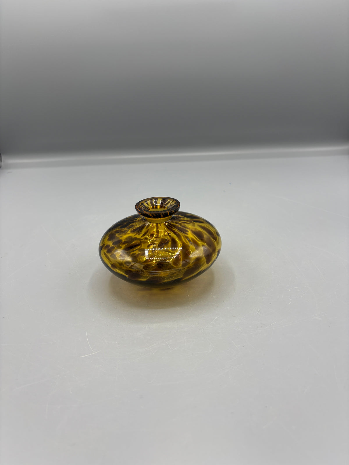 Vintage art glass Amber tortoise perfume bottle