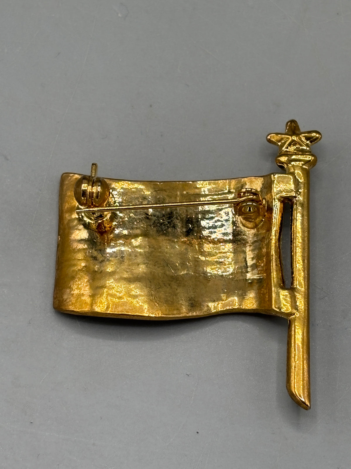 Gold tone American flag brooch