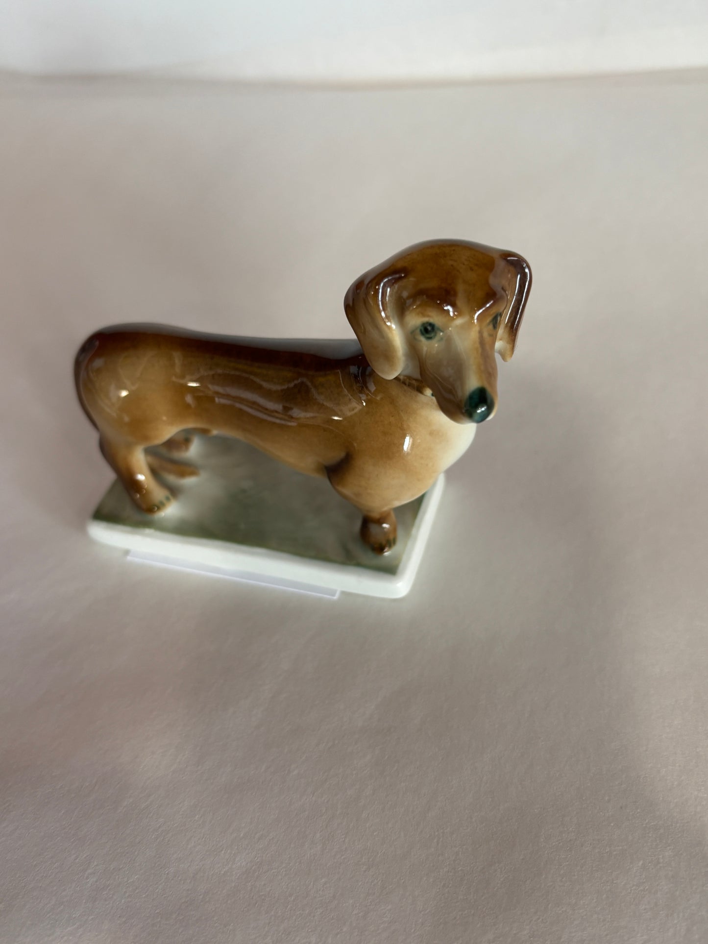 Vintage Zsolnag Hungary Dachsund Dog on Green Stand w/ Green Stamp