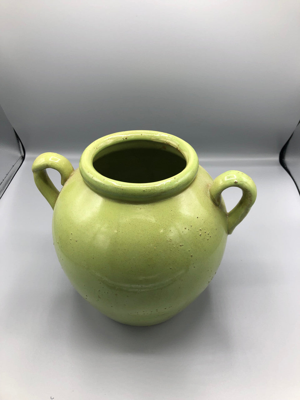 Green container with handles