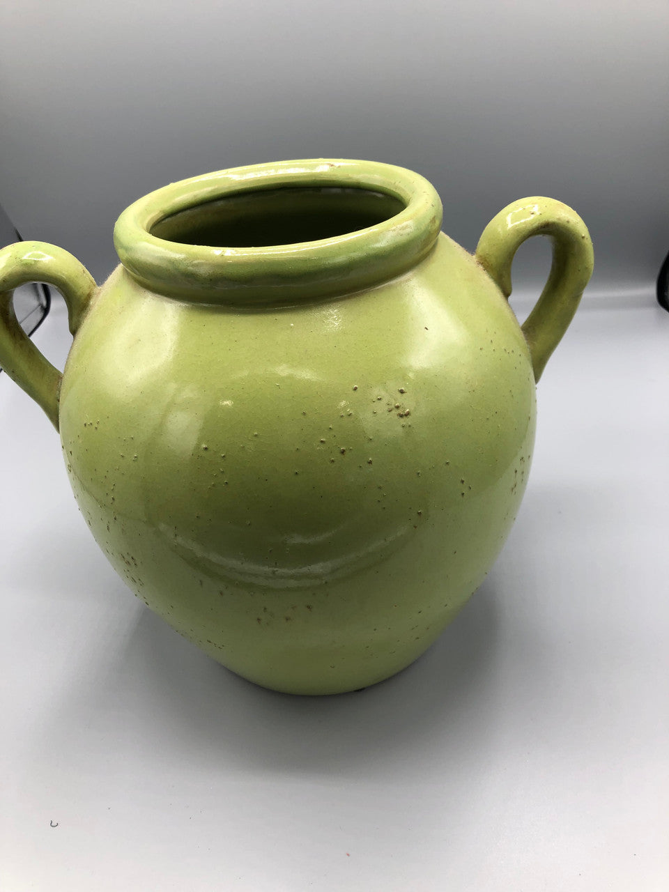 Green container with handles