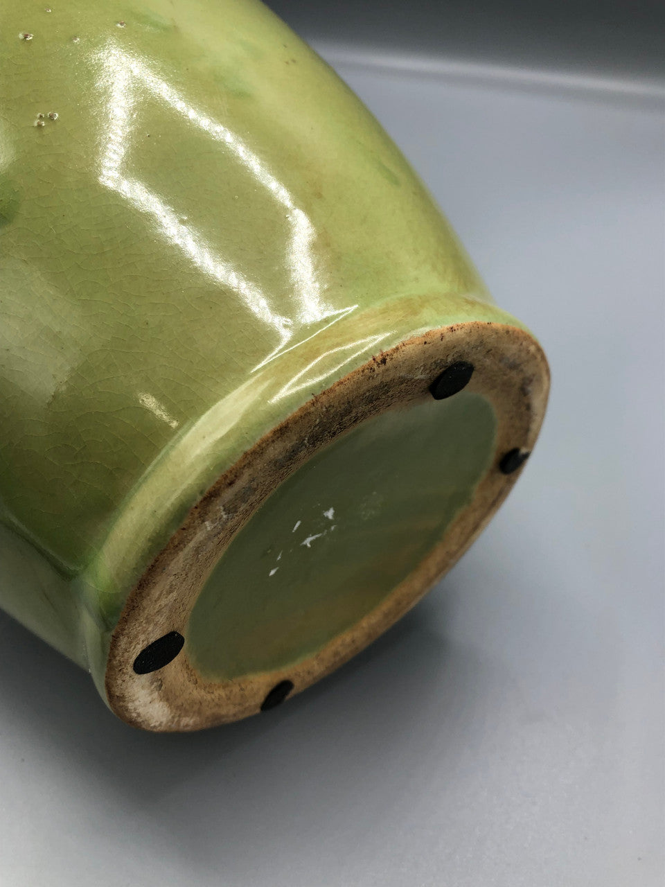 Green container with handle