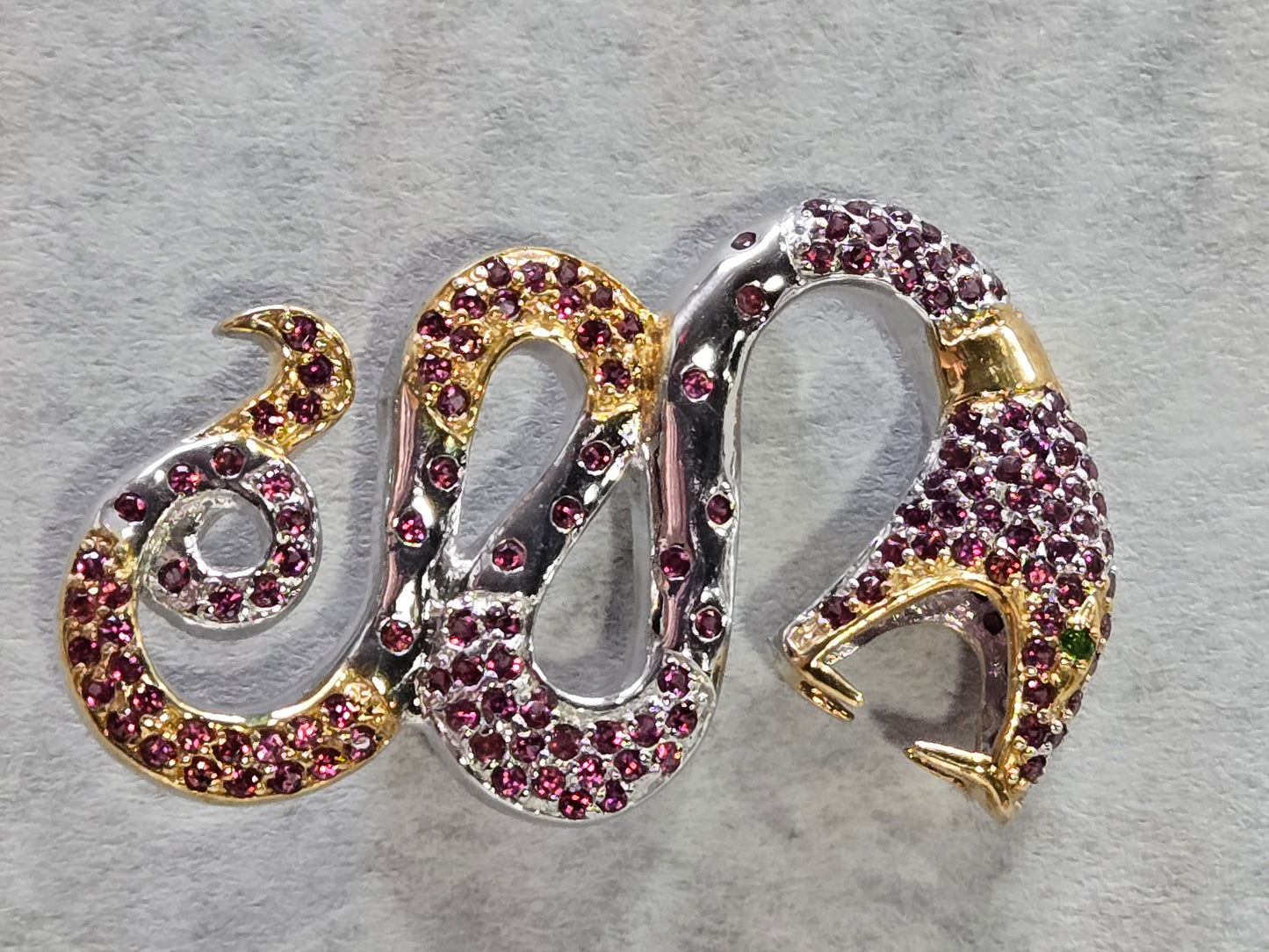 Sterling Silver Garnet Snake Brooch w/ Gold Wash Accents