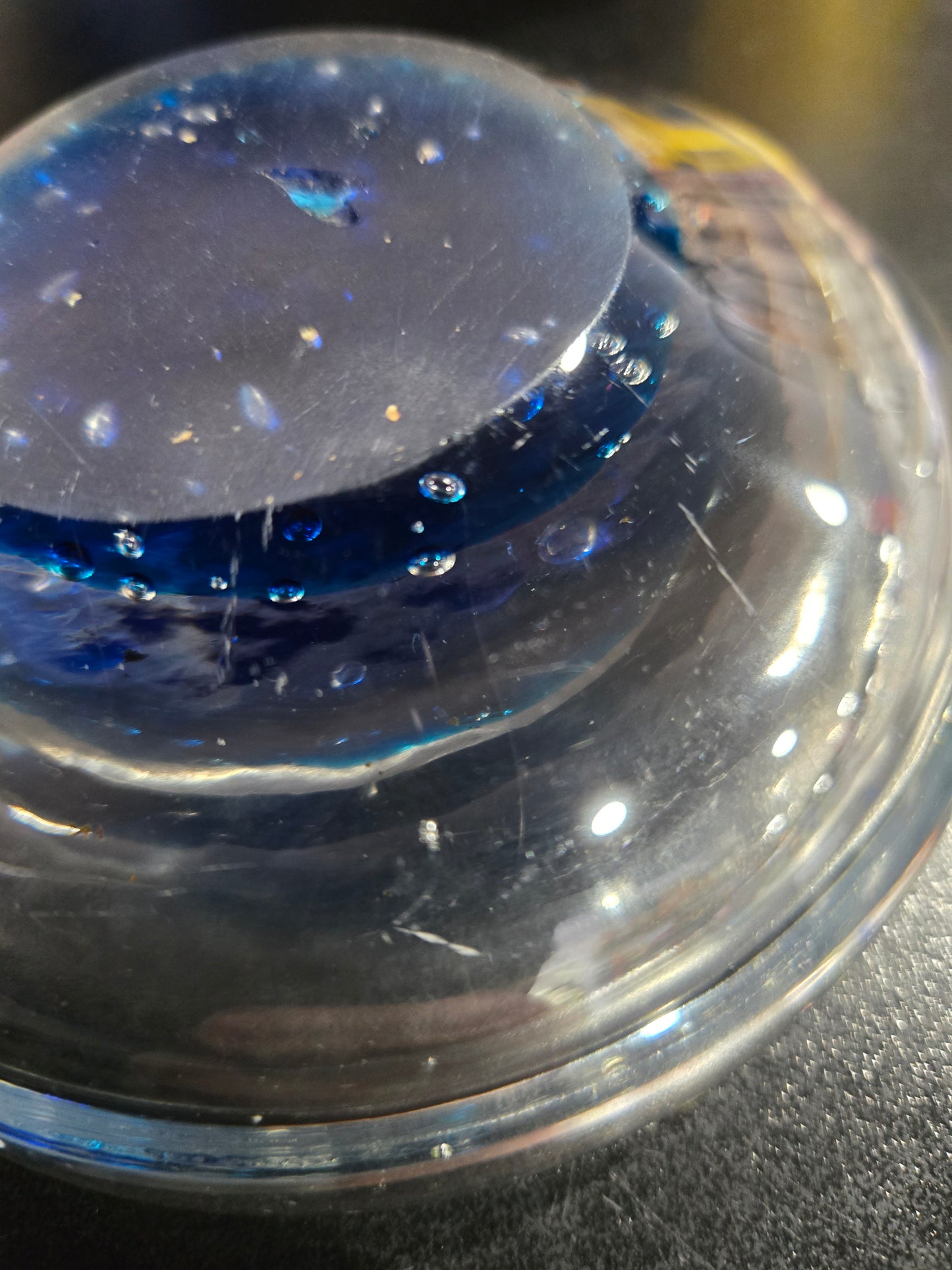 Clear glass bowl with orange fish & bubbles