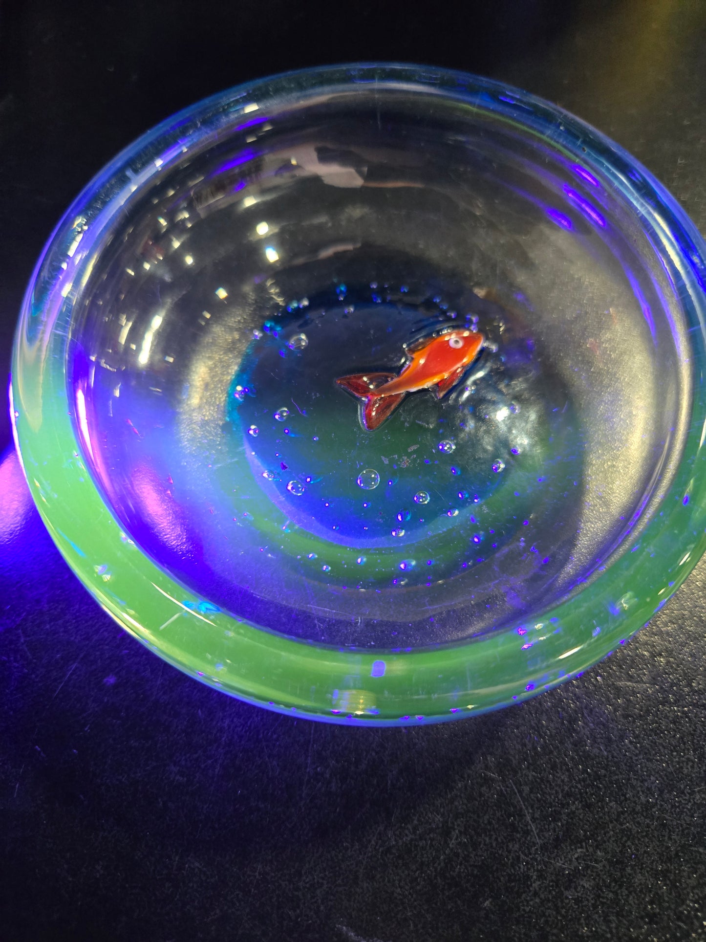 Clear glass bowl with orange fish & bubbles