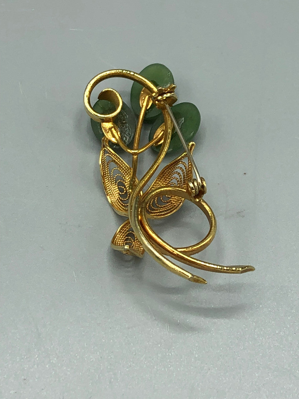 Gold tone Jade flower brooch