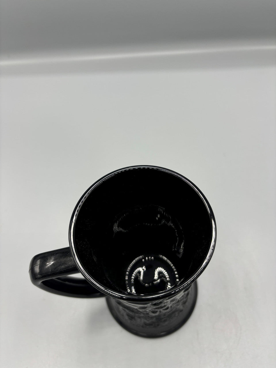 Black milk glass with tavern scene cup