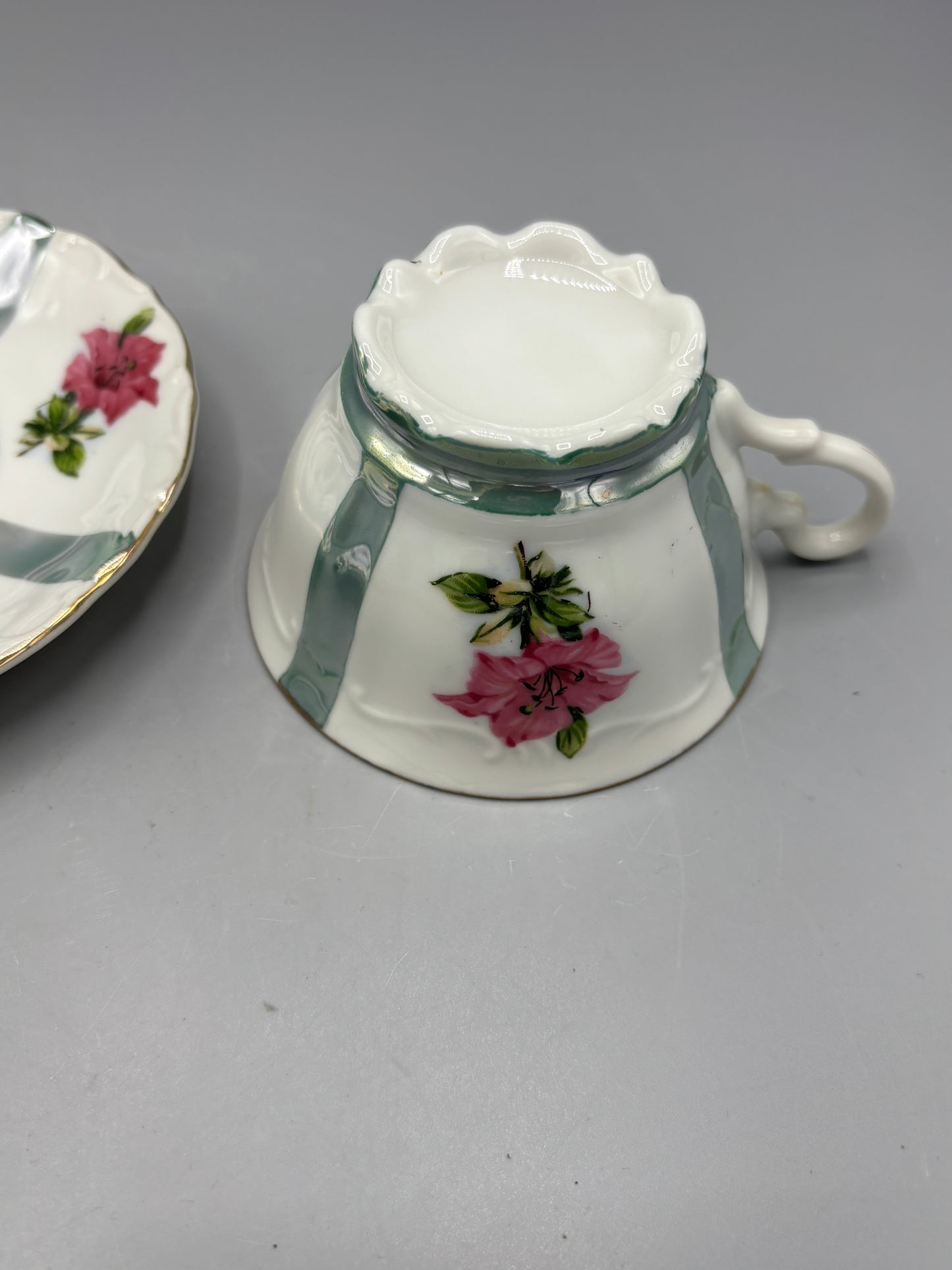 Vintage porcelain teacup & saucer with pink flowers