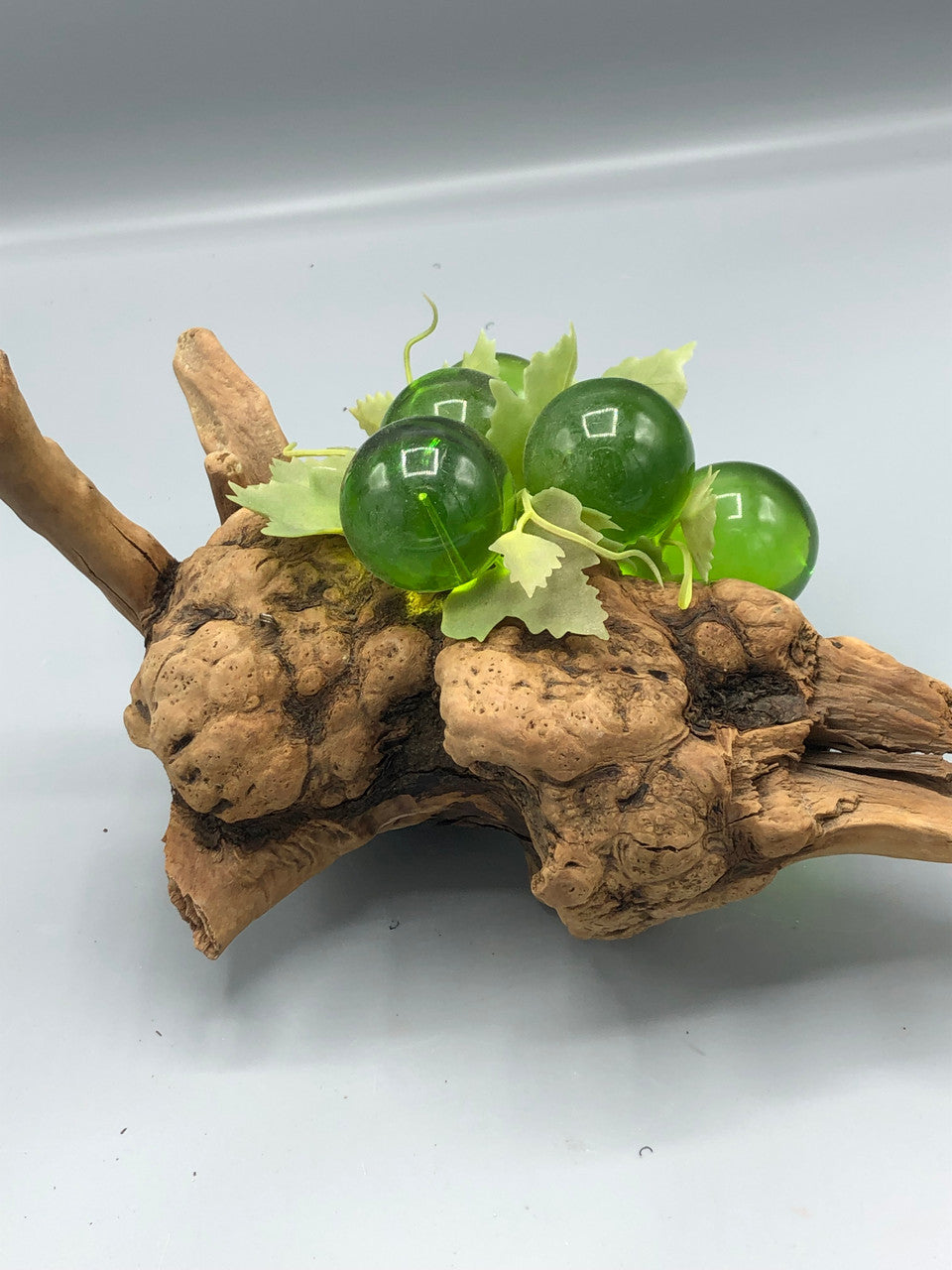 6 Cluster green grapes on wood