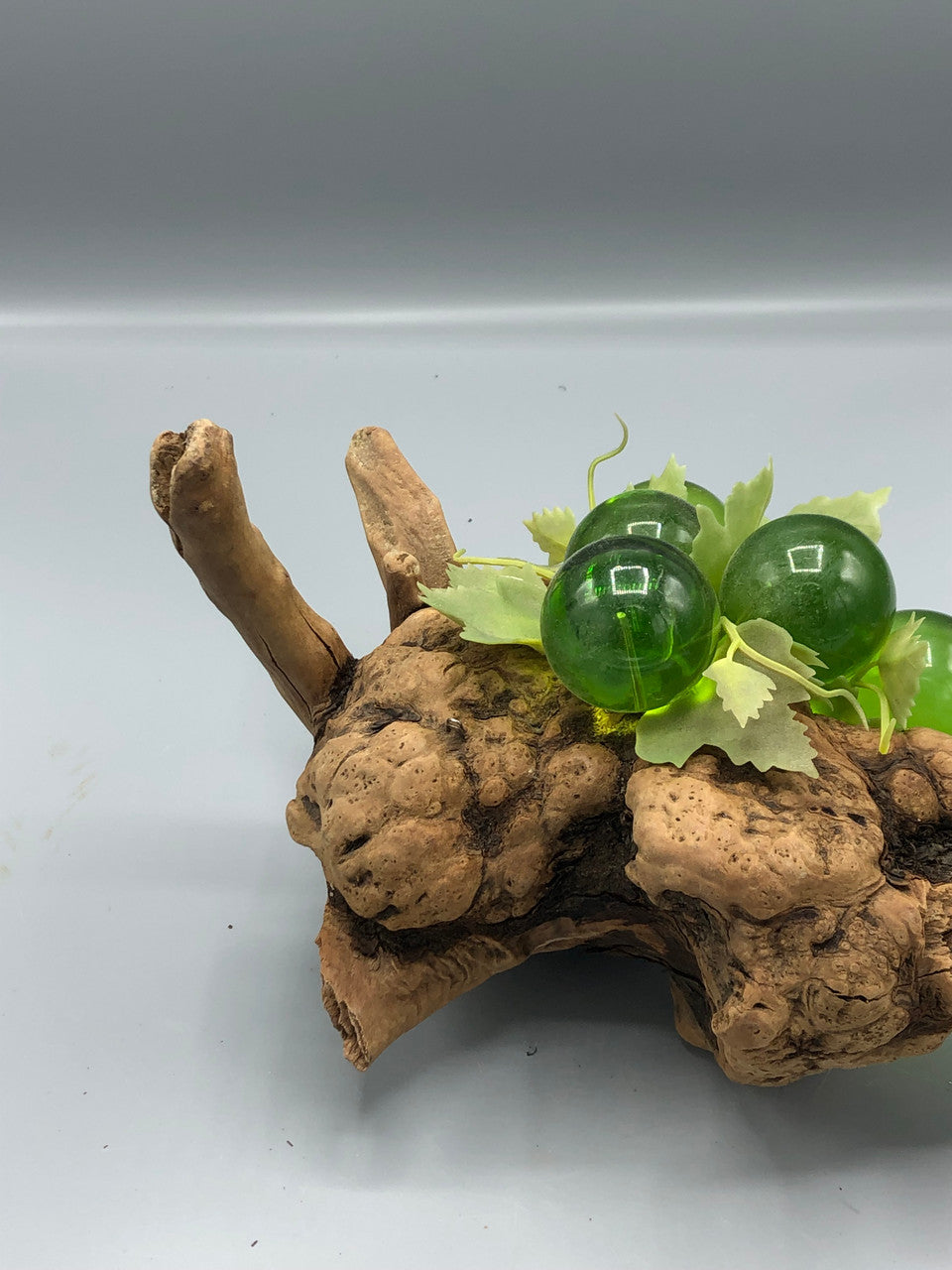 6 Cluster green grapes on wood