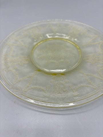 Yellow depression glass saucer