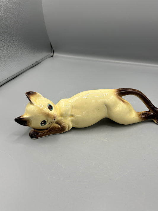 Vintage ceramic reclining Siamese cat