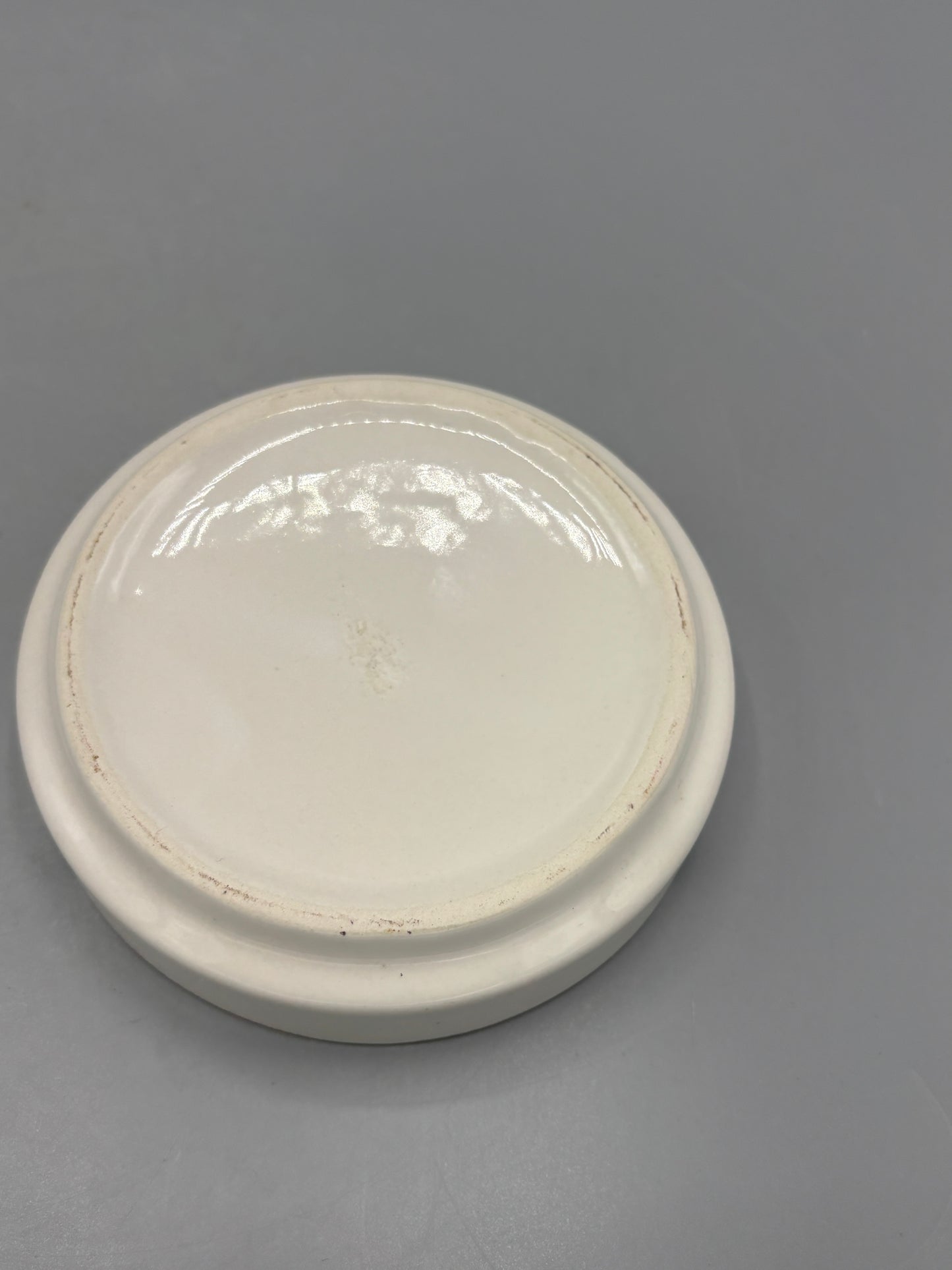 Vintage Ceramic ashtray featuring Village of Tobbaccoville