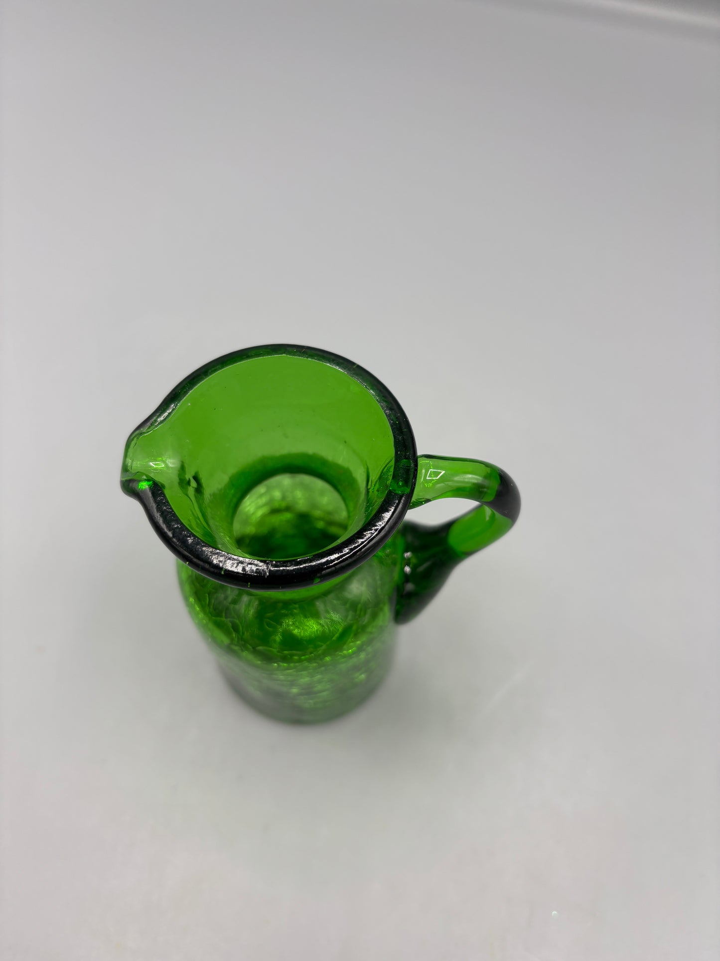 Emerald green crackle glass pitcher