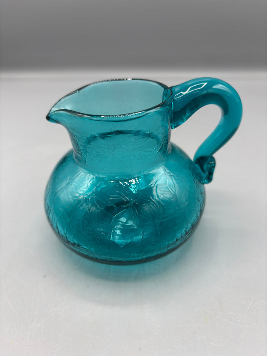 Teal hand blown textured glass pitcher