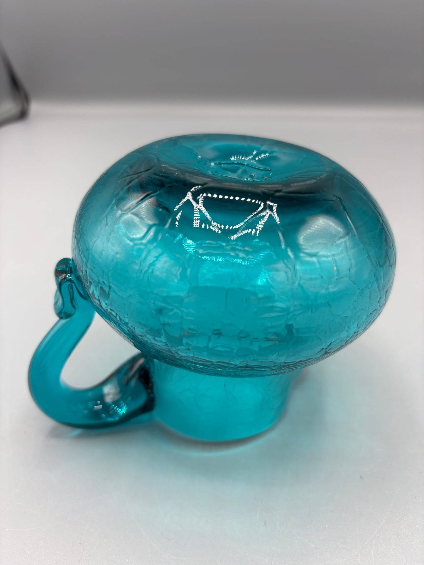 Teal hand blown textured glass pitcher